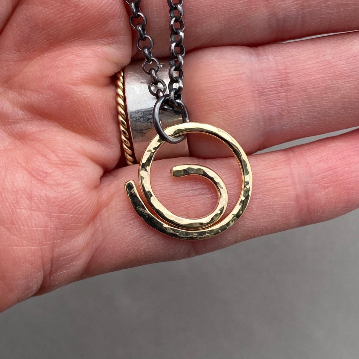Center of it All Energy Swirl Necklace