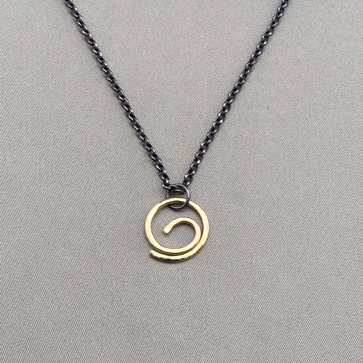 Center of it All Energy Swirl Necklace